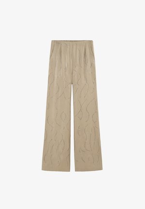 Beige wijde broek van gladde stof, met een golvend zilver patroon en een elastische tailleband, voorzien van zijzakken.