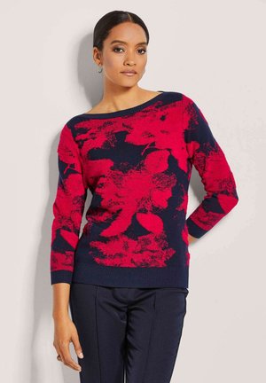 Strickpullover mit navyfarbigem Grund und großen roten Blumenmustern, weitem Rundhals und langen Ärmeln. Strukturierter Stoff mit gerippten Bündchen.