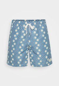 Zili peldbikses ar baltu auklu, rotātas ar saulīšu un apļu rakstu krēmkrāsā un tumši zilā krāsā. Izgatavotas no viegla materiāla.