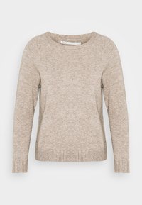Pull beige en maille avec un col rond, des manches longues et des poignets et un ourlet côtelés. Texture douce, conception légère et coupe décontractée.