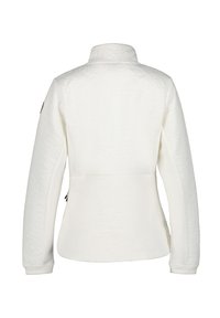 Giacca isolante bianca con collo alto, motivo testurizzato, tasche laterali e taglio aderente. Presenta polsini e chiusure a zip.