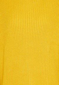 GAP Stickad tröja - yellow