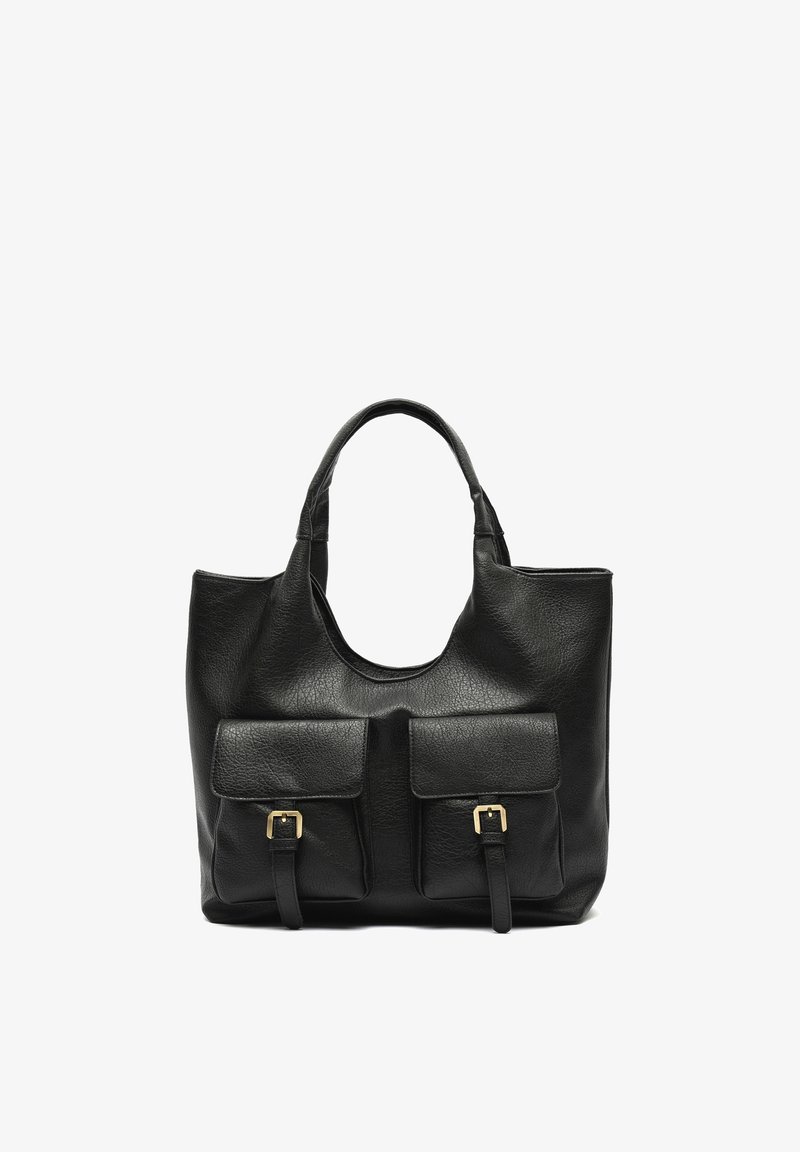 Sac à main en cuir noir avec deux poches frontales à boucles et deux petites poignées doubles, présenté sur fond blanc.