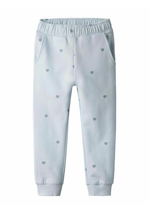 Pantaloni sportivi azzurri con vita elasticizzata, tasche laterali e un motivo di piccoli cuori grigi. Polsini alla caviglia per una vestibilità aderente.