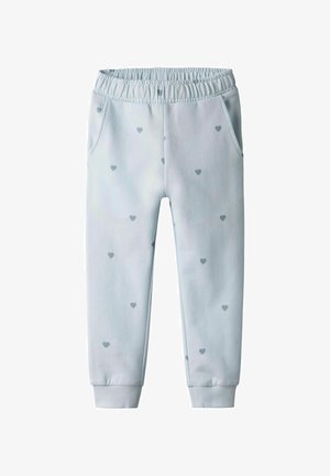 Lichtblauwe joggingbroek met een elastische tailleband, zijzakken en een patroon van kleine grijze hartjes. Boorden bij de enkel voor een comfortabele pasvorm.
