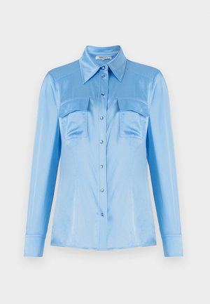 Light blue satin button-up shirt with long sleeves, two front pockets, and a pointed collar. Features pearlized buttons and a smooth texture.