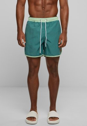 RETRO - Swimming shorts - paleleaf vintagregreen