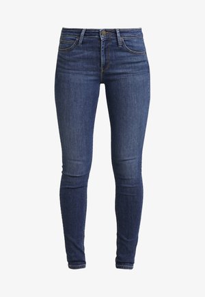 Dark blue skinny jeans made of denim, featuring a high waist, five-pocket design, and subtle stitching details. Smooth texture and fitted shape.