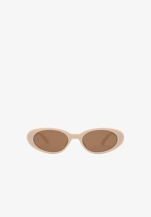 Lunettes de soleil beige clair avec des verres ovales ; verres teintés marron ; cadre en plastique lisse ; design minimaliste sans logo ni embellissements visibles.