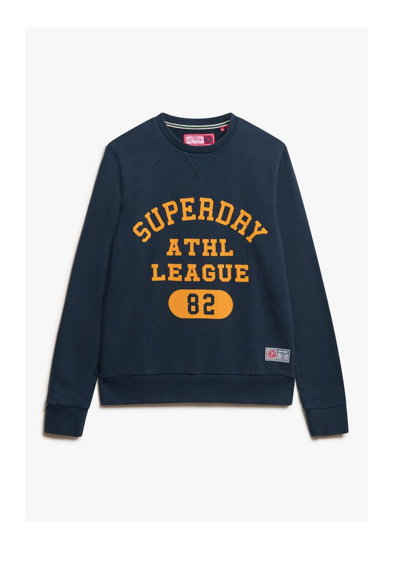 Navy Sweatshirt aus Baumwolle mit leuchtend gelber Schrift "SUPERDAY ATHL LEAGUE 82" und einem kleinen Logo-Patch an der unteren Seite.