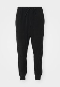 Zwarte joggingsbroek van zacht materiaal met een verstelbare tailleband, elastische boorden en zijzakken; gladde textuur met minimale details.
