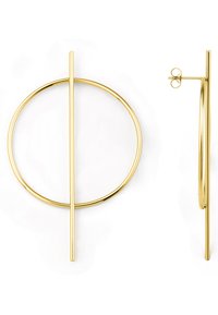 Gullrunder øredobber med en rett stift som krysser ringen, med en glatt metallisk tekstur og moderne geometrisk design.