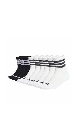 Sets of black and white ankle socks, each with two horizontal stripes near the top and a small logo on the toes, arranged side by side.