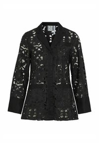Blazer en dentelle noire présentant des motifs floraux découpés, un col, une fermeture à bouton unique à l'avant, deux poches avant et des manches pleines noires contrastantes.