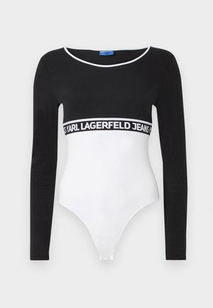 Black and white long-sleeve bodysuit with a scoop neckline and contrasting waistband featuring the text "KARL LAGERFELD JEANS." Smooth texture.