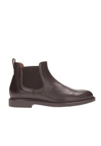 Stivale Chelsea in pelle marrone con pannelli laterali elastici, punta arrotondata e una finitura leggermente texturizzata. Suola robusta con dettagli di cucitura discreti.