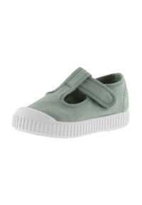Scarpa in tela verde dallo stile Mary Jane, con suola in gomma bianca e fascia in Velcro. Texture liscia e design con punta arrotondata.