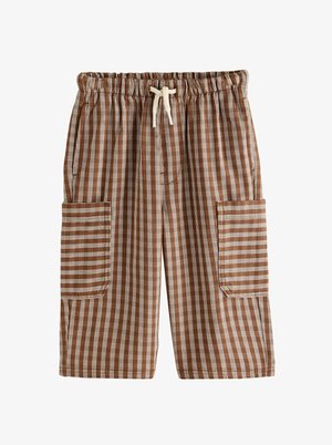 Pruunide ja valgete vertikaalsete triipudega lühikesed püksid, elastse vöökohaga, ees nöörkinnitusega ja kahe suure kaubataskuga külgedel.