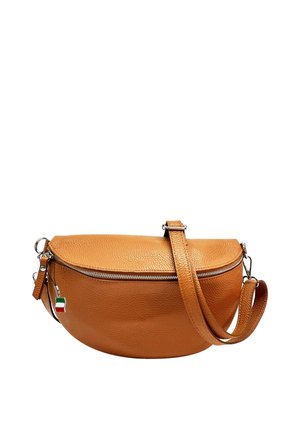 Tan leather crossbody bag with silver zipper and detachable strap, featuring a small Italy flag charm on the zipper pull.
