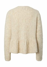 Pull beige texturé à manches longues, col rond et détail peplum à l'arrière, confectionné dans un matériau doux et duveteux.