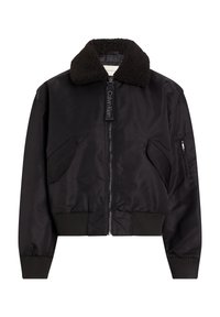 Svart bomberjakke med faux shearling krage, glidelås foran, ribbestrikkede mansjetter og en glidelåslomme på ermet. Glatt stoff med minimalistisk design.