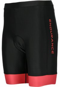 Svarta träningsshorts med röda detaljer vid fållen. Har ett andningsbart material, elastisk midja och en sitter tätt. Varumärkesnamnet tryckt vertikalt.