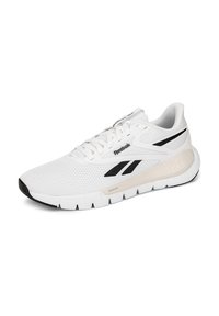 Biele a čierne bežecké tenisky Reebok s pleteným zvrškom, polstrovanou podrážkou a šnurovacím dizajnom z boku.