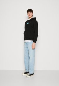 HUGO DARATSCHI - Hoodie - black