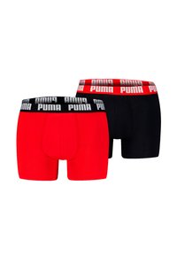 Rote und schwarze Boxershorts mit elastischen Markenbund; glatter Stoff, eng anliegende Passform und kontrastierende Farben heben die Designdetails hervor.