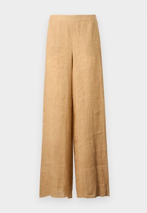 Pantalon large en lin beige à taille haute sans fermetures visibles, présenté sur un fond clair uni.