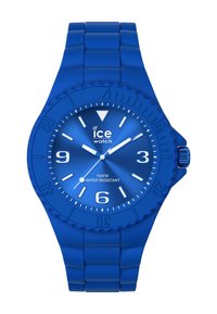 Reloj de silicona azul con una esfera redonda, marcadores de horas blancos y un bisel texturizado. Resistente al agua hasta 10 ATM.