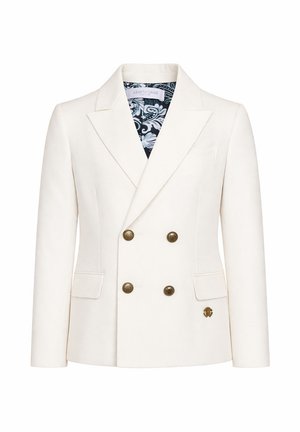 Blazer blanc croisé avec boutons dorés, revers crantés, poches à rabat et doublure intérieure à motifs noir et blanc.