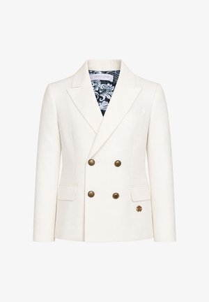 Blazer blanc croisé avec boutons dorés, revers crantés, poches à rabat et doublure intérieure à motifs noir et blanc.