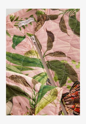 Quilted bomber jacket in pink fabric featuring a botanical print with green leaves and butterflies, detailed silver zipper closure.