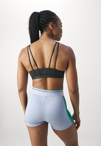 adidas Performance ALL ME ESSENTIALS - Sujetadores deportivos con sujeción ligera - black