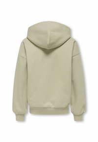 Sweatshirt beige surdimensionné avec de longues manches, des poignets côtelés et une capuche, vu de dos sur un fond blanc.