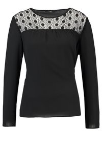 Czarny top z długim rękawem, z koronkową górą ozdobioną kwiatowym wzorem. Gładki materiał, okrągły dekolt i dopasowany krój.