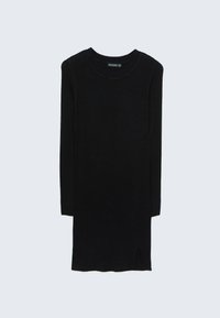 Robe noire en maille manches longues avec encolure ronde et petite fente latérale à l'ourlet sur fond gris clair.