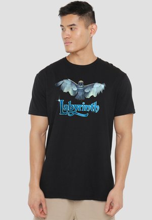 Black cotton t-shirt featuring an owl graphic in blue and gray, with the word "Labyrinth" in stylized light blue text. Short sleeves.