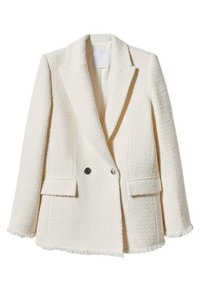 Beige strukturierter Blazer mit klassischem Revers, doppelter Knopfleiste, zwei vorderen Taschen und fransigen Kanten. Akzente in Silber.