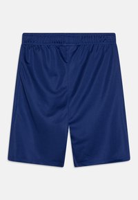 Námořnické modré sportovní kraťasy vyrobené z lehkého, hladkého materiálu. Mají elastický pas a minimální švy.