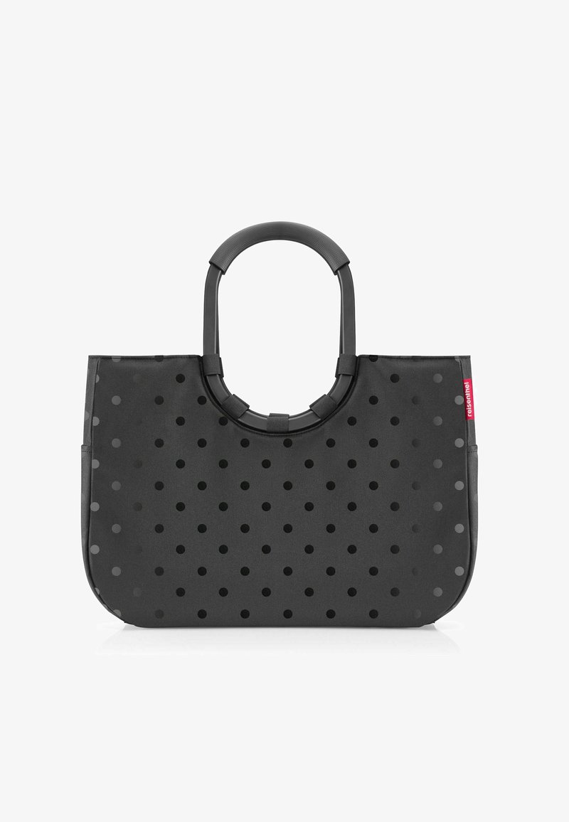Schwarze Tragetasche mit glänzenden schwarzen Punkten, glatter Textur, abgerundeten Tragegriffen und einem dezenten Logoetikett an der Seite.