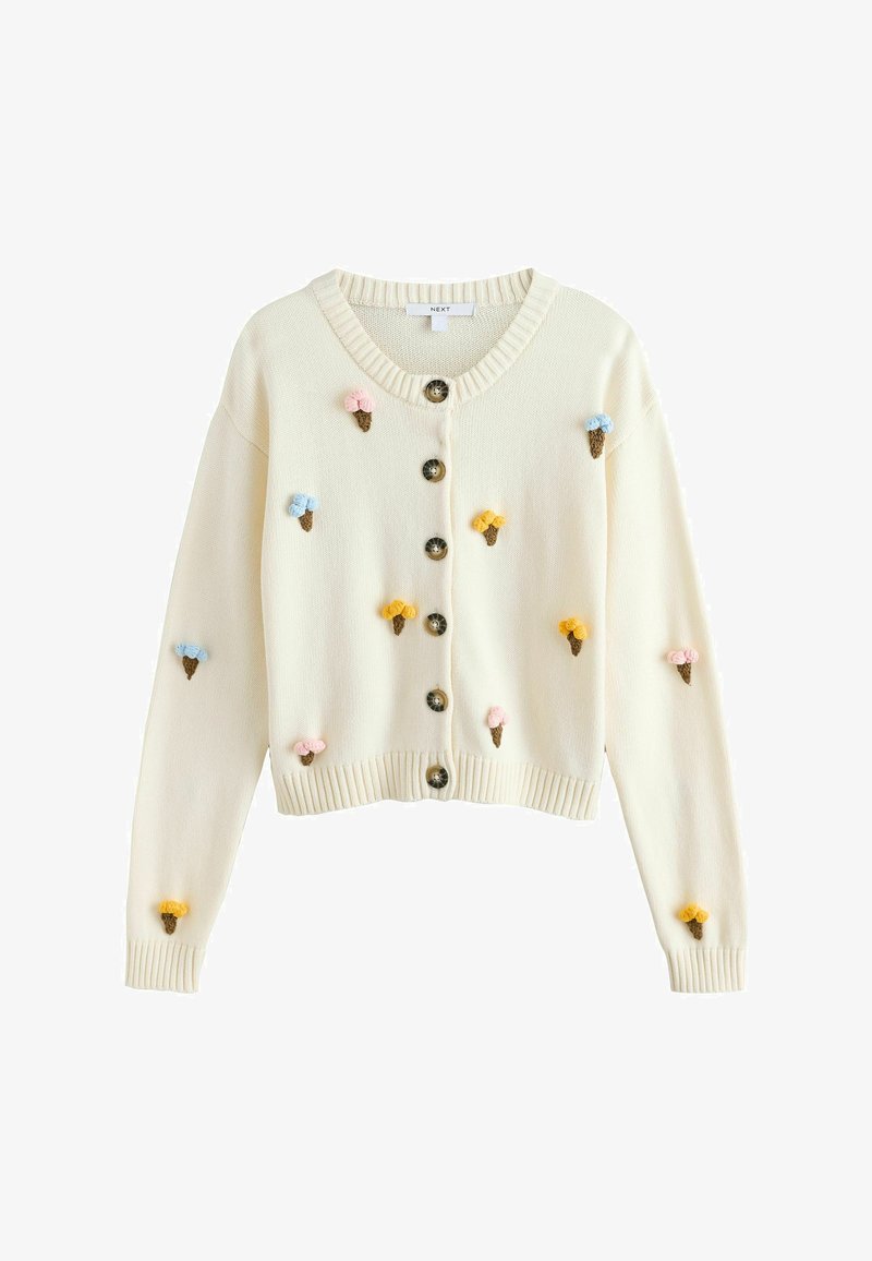 Cardigan tricoté crème avec boutons sur le devant, décoré de petites applications en forme de cônes de glace rose, bleu et jaune à l’avant et sur les manches.