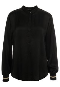 Schwarze Bluse mit langen Ärmeln, Stehkragen, Knopfverschluss und texturiertem Stoff. Die Manschetten haben einen schwarzen und goldenen Akzentstreifen.