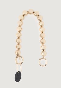 Gold-tone chain featuring rounded, polished beads and dual metal rings. Includes a tag with embossed text on a black oval leather background.