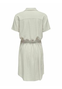 Robe courte à manches courtes couleur beige clair avec col, taille élastique et ourlet arrivant au genou, vue de dos sur fond blanc.