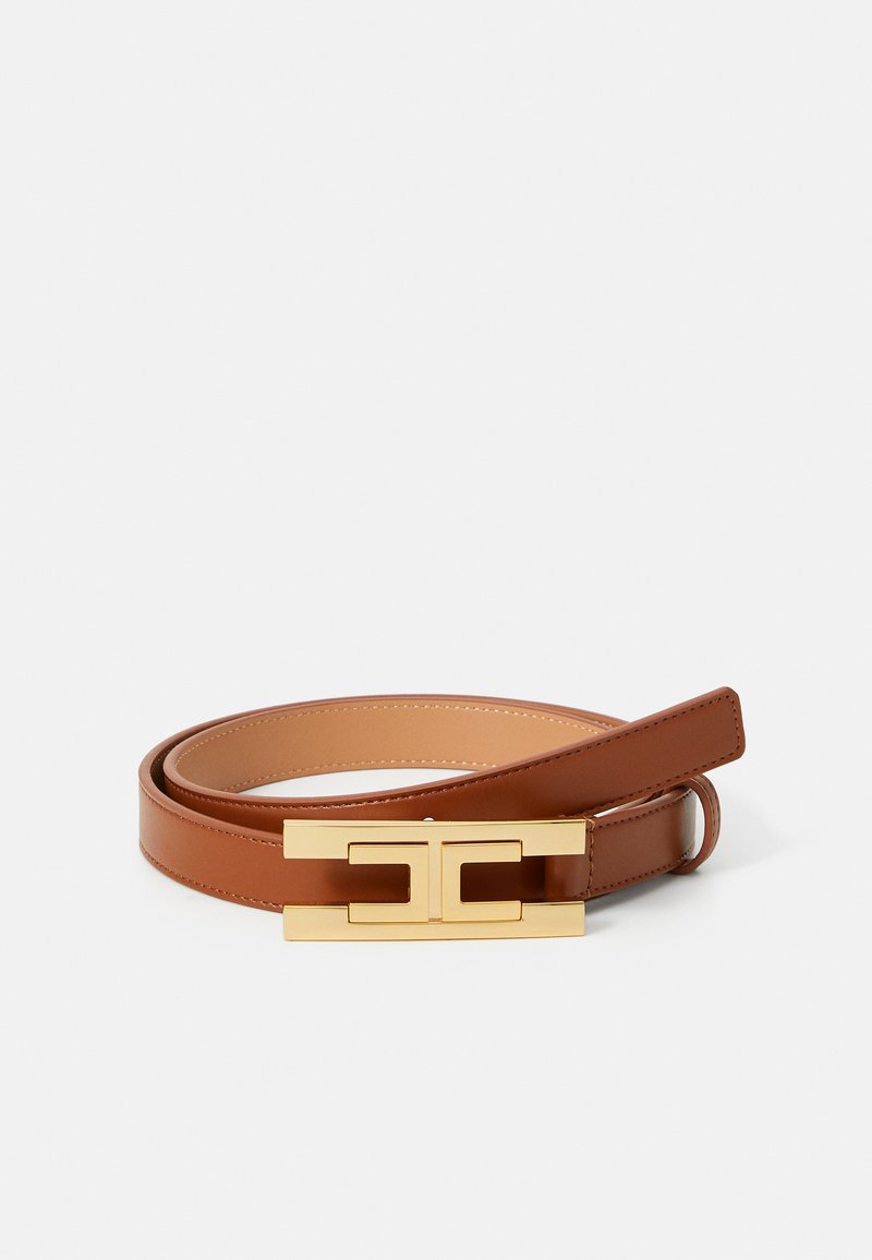 Brown leather belt rolled with rectangular gold buckle featuring a geometric cutout design on a white background.