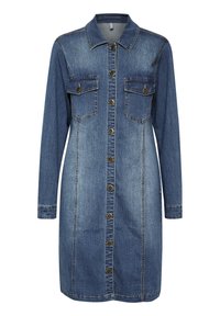 Džinsu krekls-aste, vidēji zilā krāsā, ar garām piedurknēm, ar pogām priekšpusē un zelta akcentiem, divām krūšu kabatām un apkakli. Klasisks un funkcionāls dizains.