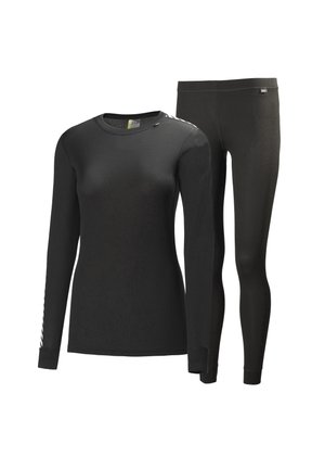 Zwarte thermische top met lange mouwen en bijpassende legging in een gestructureerde stof, met een ronde halslijn en een slim fit ontwerp.
