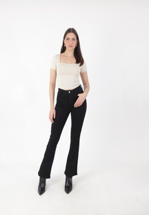 WIDE - Vaqueros slim fit - schwarz